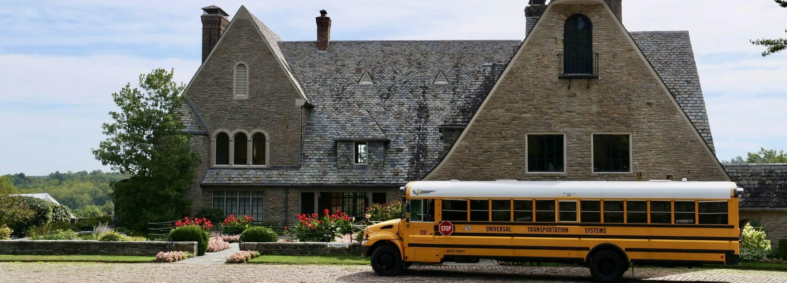 arts-center-field-trip-bus school bus in front of arts center